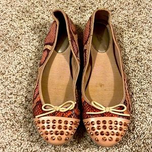 Rachel Roy pink, peach snake skin flats with rose gold spike detail gently used